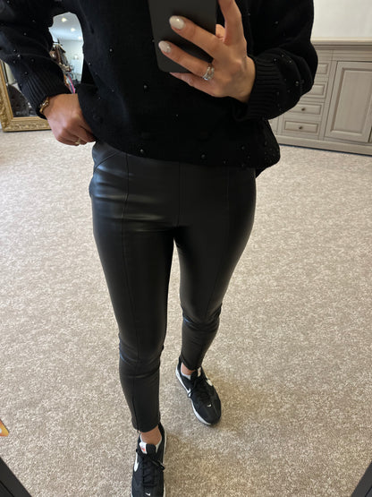 Leather leggings, elasticated waist and zippered hems - Black