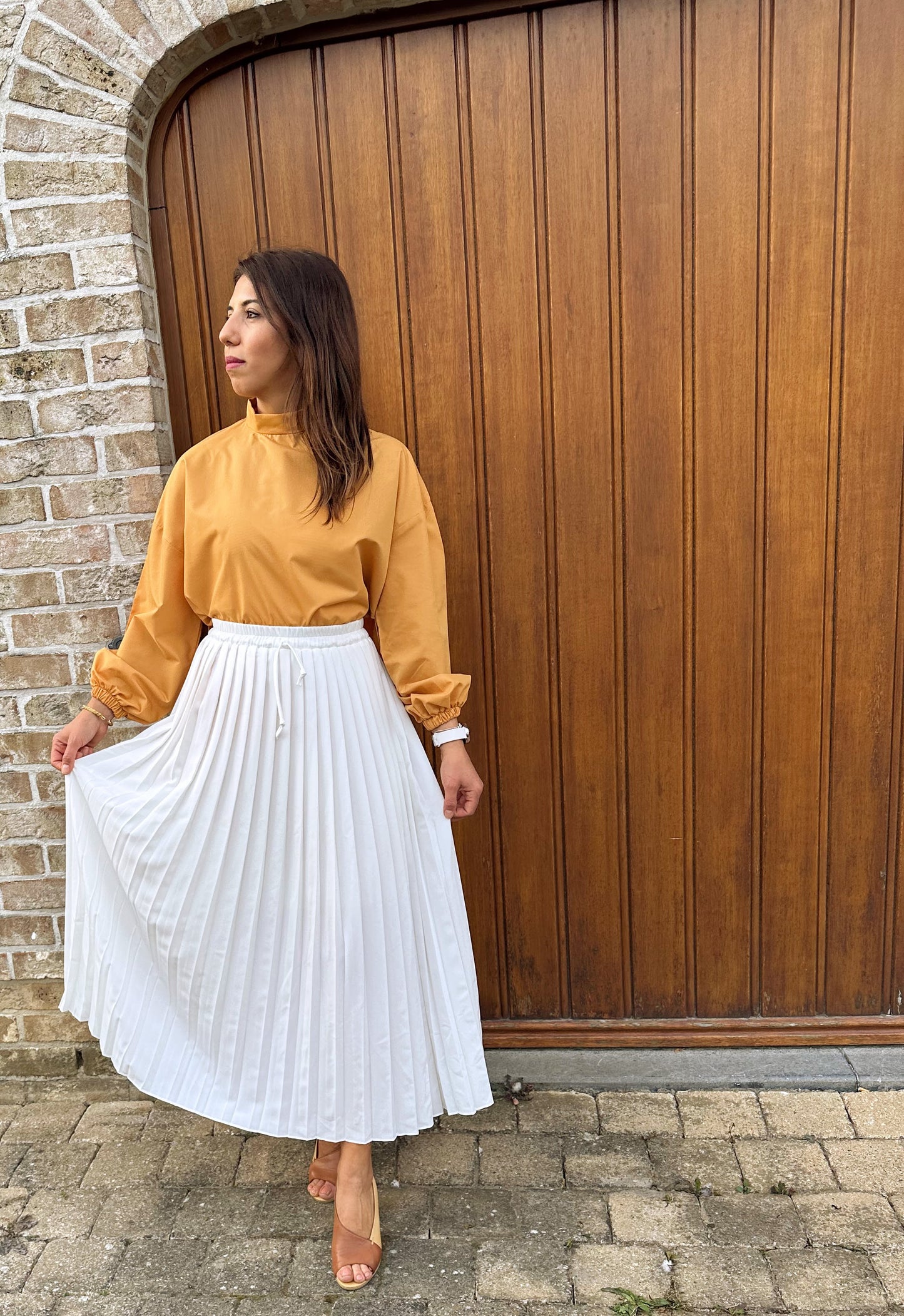 Witte elastische geplooide lange rok