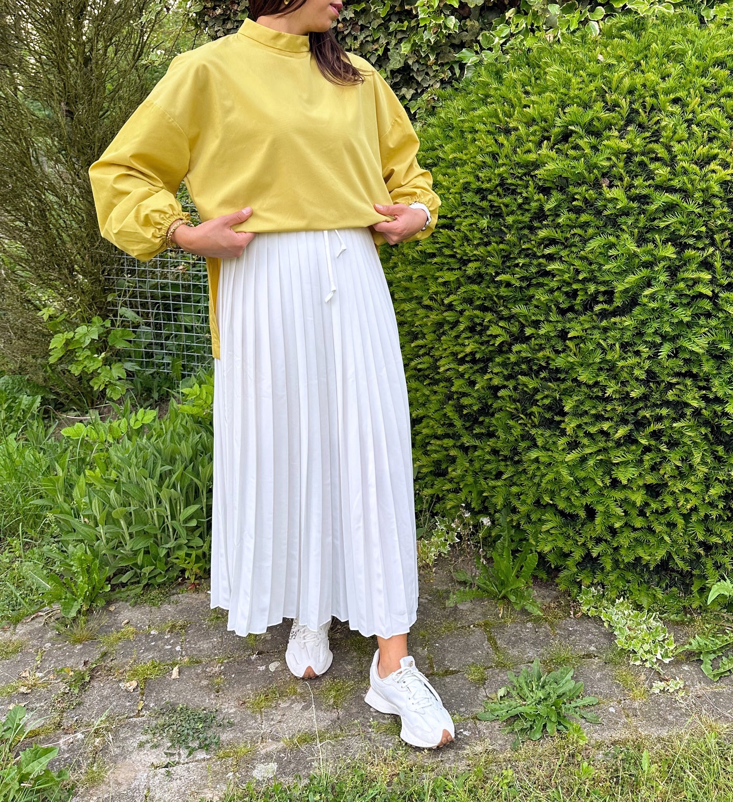 Witte elastische geplooide lange rok